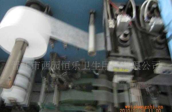 晋江市西园恒乐机器设备图案--卫生巾，尿裤生产机器一角